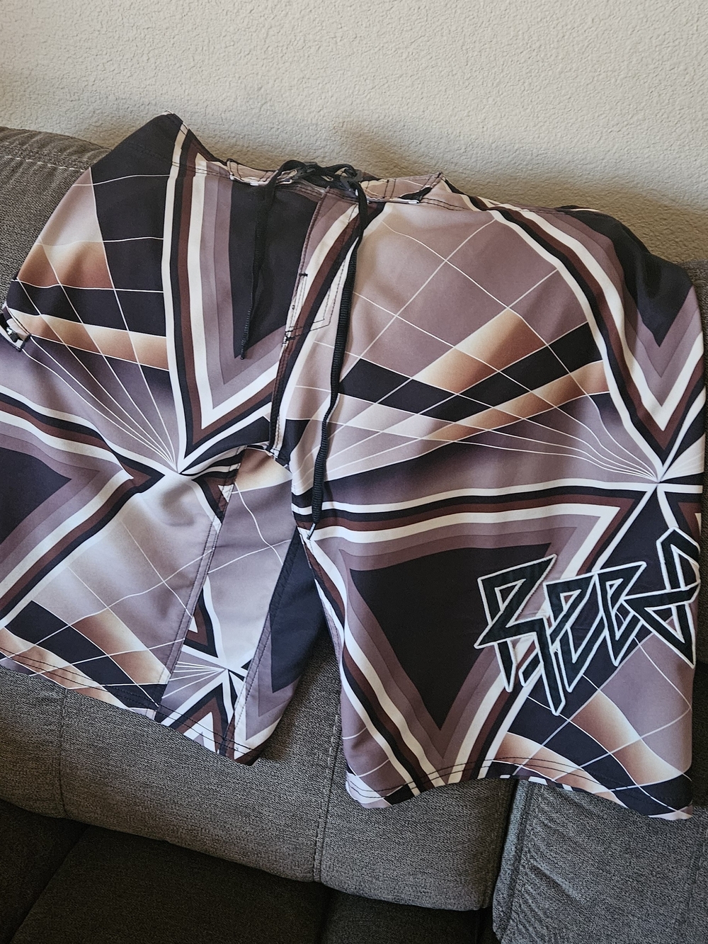Geometric Star Print Swim Shorts in Brown and Black